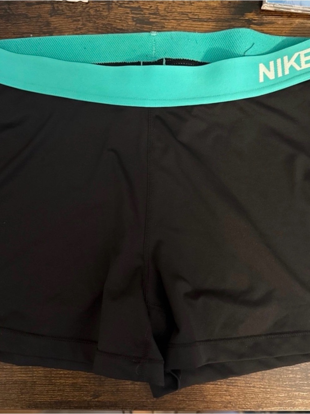 Nike Pro Women’s Black Shorts with Teal Waistband